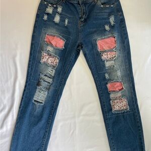 Chic Blue and Pink Boyfriend Jeans with Distressed Design